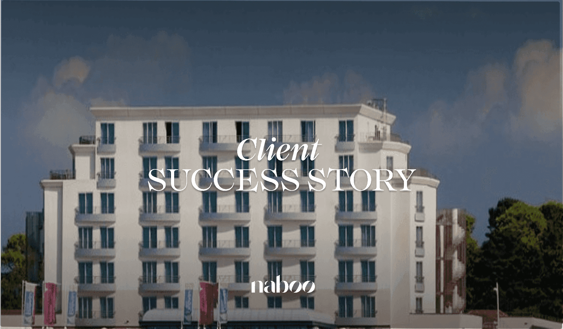 Exterior view of a modern multi-story white hotel or corporate event venue with balconies under a blue sky.