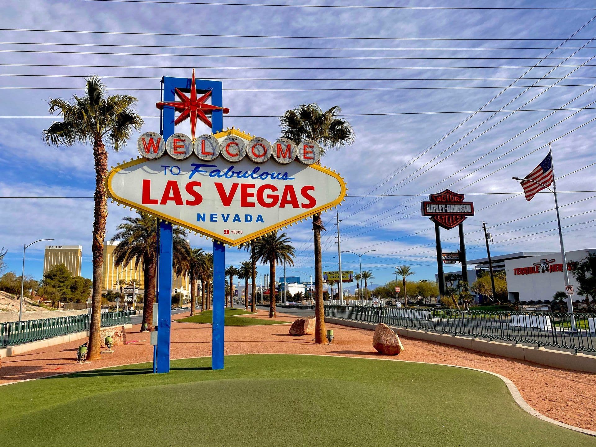 The iconic Welcome to Fabulous Las Vegas sign with palm trees, a top destination for corporate events.